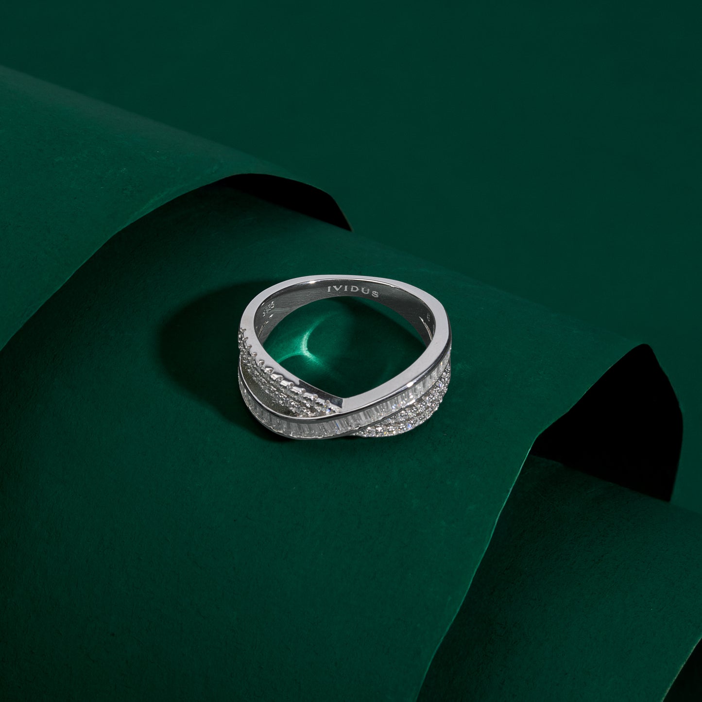 Bridgford - Emerald and Round Cut Moissanite Band Ring