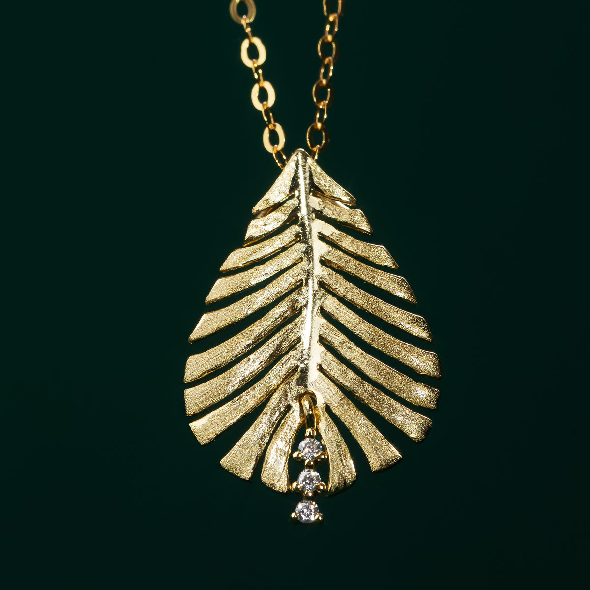 Featherstone - Brushed Gold Feather-design Moissanite necklace